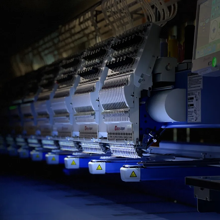 Multi-head embroidery machines
